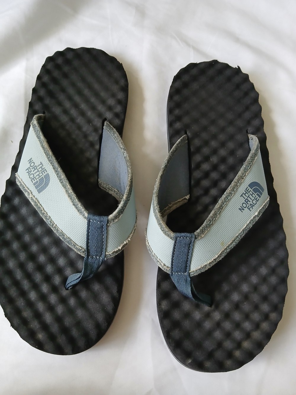 The North Face Blue and Black Flip Flop Sandals